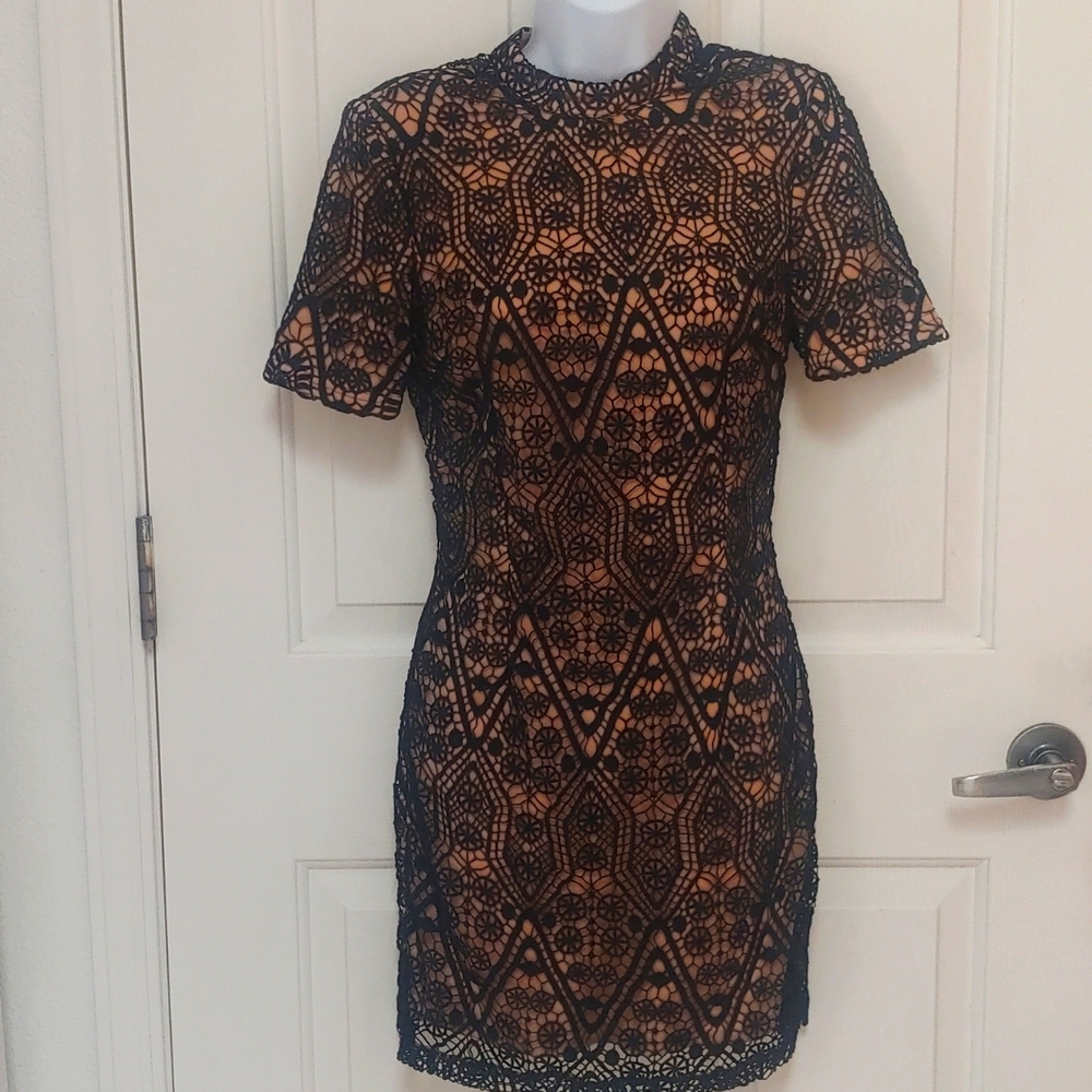 Forever 21 dress, tan lining with like Stitch embroidery, size small